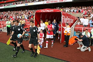 Arsenal captain William Gallas leads out the team