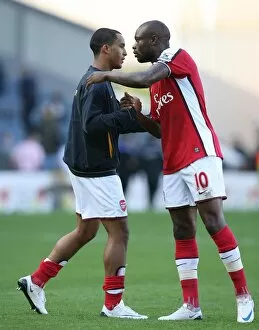 Blackburn Rovers v Arsenal 2008-9 Collection: Arsenal captain William Gallas with Theo Walcott after the match