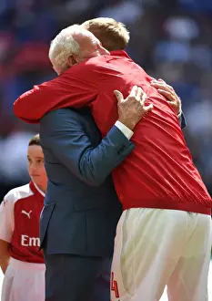 Arsenal Captains Past and Present: Per Mertesacker Embraces Bob Wilson Before FA Community Shield Match