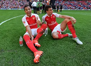 Arsenal Celebrate Community Shield Victory over Chelsea (2015): Santi Cazorla and Laurent Koscielny Rejoice