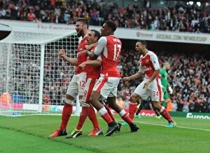 Arsenal v Southampton 2016-17 Collection: Arsenal Celebrate Double Goals: Cazorla, Giroud, Iwobi, and Coquelin vs. Southampton (2016-17)