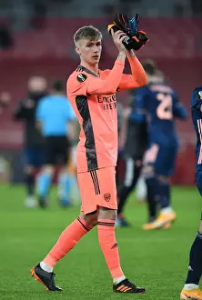 Arsenal Celebrate Europa League Victory over Rapid Wien: Alex Runarsson's Triumphant Clap