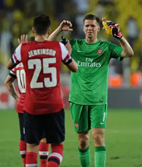 Fenerbahce V Arsenal 2013-14 Prints: Arsenal Celebrate First Leg Victory over Fenerbahce: Wojciech Szczesny and Carl Jenkinson