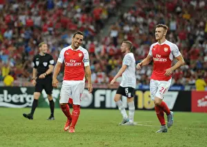 Arsenal V Everton - Asia Trophy 2015-16 Prints: Arsenal Celebrate Goals: Santi Cazorla and Calum Chambers vs