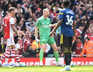 Arsenal V Manchester United 2021-22 Prints: Arsenal Celebrate Manchester United Penalty Miss: Ramsdale's Heroic Moment in Arsenal vs