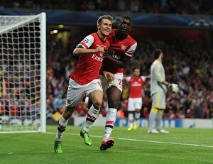 Uefa Champions Laegue Collection: Arsenal Celebrate: Ramsey and Sanogo Score in Champions League Victory