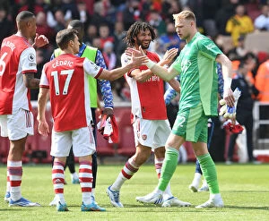 Arsenal v Manchester United 2021-22 Collection: Arsenal Celebrate Victory: Ramsdale, Elneny, and Cedric Reunite After Arsenal vs Manchester United