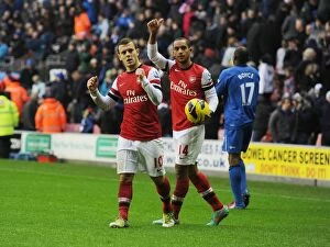 Images Dated 22nd December 2012: Arsenal Celebrate Victory Over Wigan Athletic in Premier League Showdown (2012-13)