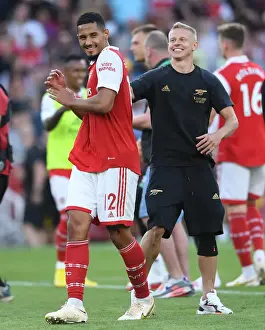 Arsenal Celebrate Win Against Fulham: William Saliba and Oleksandr Zinchenko