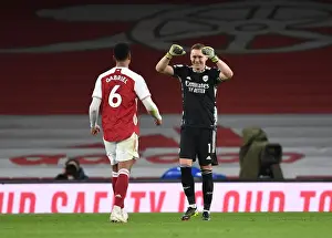 Arsenal Celebrate Win Against Tottenham Amidst Empty Emirates Stadium