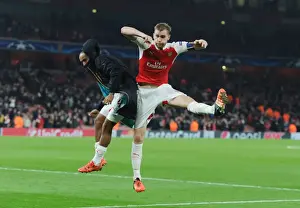 Arsenal V Bayern Munich 2015/16 Prints: Arsenal Celebrates Champions League Victory Over Bayern Munich (2015/16): Theo Walcott and Per Mertesacker Rejoice