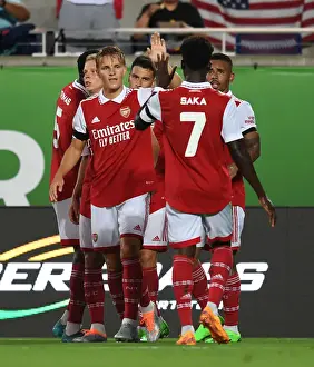 Arsenal Celebrates First Goal Against Chelsea in Florida Cup 2022-23: Martin Odegaard and Bukayo Saka Rejoice after Gabriel Jesus Score
