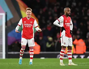 Arsenal Celebrates First Goal: Martin Odegaard Rallies Fans vs. Wolverhampton Wanderers (2021-22)