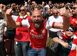 Arsenal Celebrates Third Goal Against Manchester United in Premier League Showdown (2021-22)