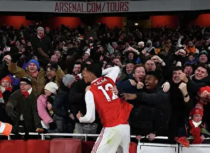 Arsenal Celebrates Third Goal Against Manchester United: Saliba's Emotional Moment with Fans (2022-23)
