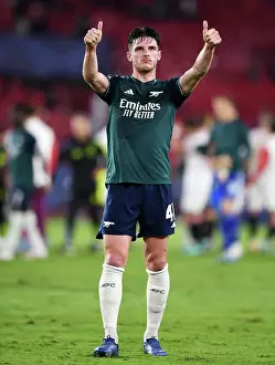 Arsenal Celebrates Victory Over Sevilla in Champions League Group Stage