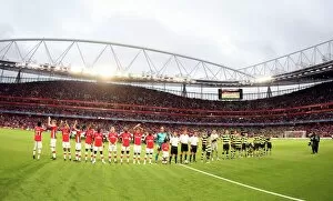 Images Dated 26th August 2009: Arsenal and Celtic line up before the match
