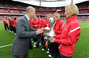 Arsenal CEO Ivan Gazidis hand the trophy to Faye White of the Arsenal Ladies Arsenal CEO Ivan Gazidis hand the trophy to Faye White of the Arsenal Ladies