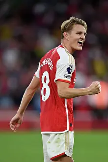 Arsenal Clinch Premier League Title: Martin Odegaard's Triumphant Victory Celebration vs. Manchester City (2023-24)