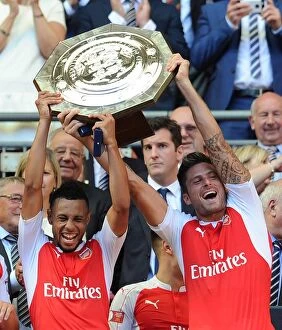 Arsenal v Chelsea - Community Shield 2015-16 Collection: Arsenal: Coquelin and Giroud Celebrate Community Shield Victory