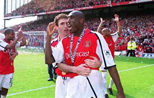 Campbell Sol Prints: Arsenal defenders Martin Keown and Sol Campbell celebrate after the match