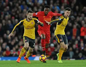 Liverpool V Arsenal 2016-17 Prints: Arsenal Defenders Mustafi and Koscielny Closing In on Liverpool's Origi in Intense Premier League Clash (2016-17)
