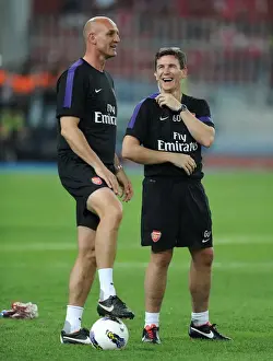 Arsenal Doctor Gary O Driscoll shares a joke with Steve Bould Arsenal Assistant Manager