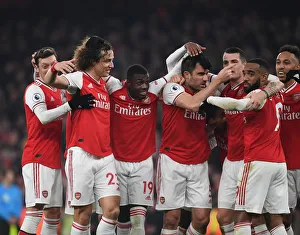 Arsenal Double Over Manchester United: Sokratis, Ozil, Luiz, Maitland-Niles, Aubameyang, Lacazette, and Xhaka Celebrate Glorious Victory (January 2020)