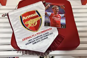 Arsenal Dressing Room: A Closer Look at the Match Pennant before Arsenal vs PSV Eindhoven, UEFA Champions League 2023/24