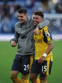 Images Dated 2nd October 2016: Arsenal Duo Alex Oxlade-Chamberlain and Granit Xhaka Share a Moment after Burnley Victory