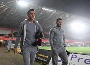 Swansea City V Arsenal 2017-18 Prints: Arsenal Duo Mesut Ozil and Sead Kolasinac Arrive at Swansea City Stadium (January 2018)