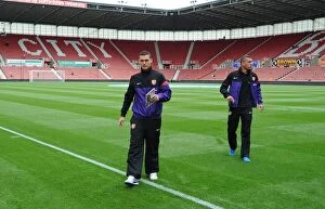 Images Dated 26th August 2012: Arsenal Duo Thomas Vermaelen and Lukas Podolski Before Stoke City Clash (2012-13)