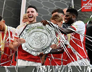 Arsenal V Manchester City - Community Shield 2023-24 Prints: Arsenal: FA Community Shield Champions 2023-24 - Declan Rice Lifts the Trophy