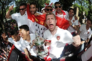 Arsenal Trophy Parade 2014 Prints: Arsenal FA Cup Champions: Ozil