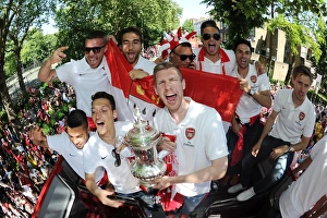 Arsenal Trophy Parade 2014 Prints: Arsenal FA Cup Champions: Ozil