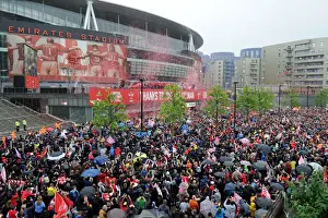 Arsenal FA Cup Final Victory Parade 2014-15 Prints: Arsenal FA Cup Victory: Triumphant Parade with the Trophy at Emirates Stadium