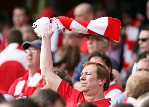 Arsenal v Portsmouth 2009-10 Collection: Arsenal fan with his scarve