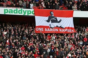 Arsenal v Burnley 2009-10 Gallery: Arsenal fans have a banner supporting Aaron Ramsey who broke his leg in the previous match
