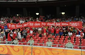 Arsenal Fans in Beijing: A Sea of Red and White during the 2012 Pre-Season Clash against Manchester City