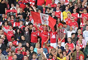 Blackburn Rovers V Arsenal 2010-11 Prints: Arsenal fans celebrate the 1st goal scored by Theo Walcott. Blackburn Rovers 1: 2 Arsenal