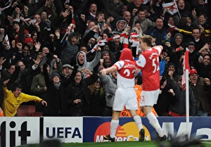 Arsenal fans celebrate the 2nd goal, scored by Andrey Arshavin. Arsenal 2:1 Barcelona Arsenal fans celebrate the 2nd goal, scored by Andrey Arshavin. Arsenal 2:1 Barcelona