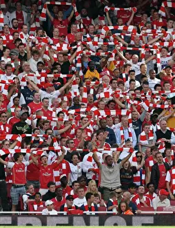 Arsenal Fans Celebrate 4:1 Victory Over Portsmouth in the Barclays Premier League at Emirates Stadium (2009)
