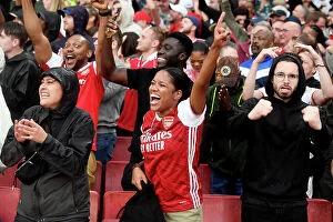 Images Dated 26th August 2023: Arsenal Fans Celebrate at Emirates Stadium: Arsenal FC vs Fulham FC, Premier League 2023-24