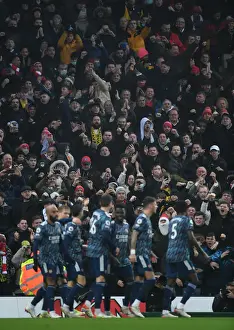 Arsenal Fans Celebrate First Goal Against Norwich City in Premier League Match, 2021-22