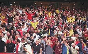 Manchester United v Arsenal 2006-7 Collection: Arsenal fans celebrate after the match