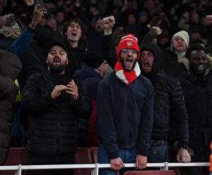 Images Dated 24th February 2022: Arsenal Fans Celebrate Second Goal vs. Wolverhampton Wanderers (2021-22)
