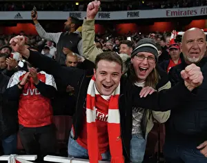 Arsenal Fans Celebrate Victory Over Liverpool in Premier League Clash at Emirates Stadium