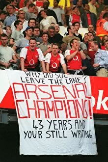 Images Dated 7th April 2005: Arsenal Fans celebrate winning the League. Tottenham Hotsour v Arsenal