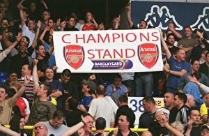Images Dated 7th April 2005: Arsenal fans with a Champions Banner. Tottenham Hotspur v Arsenal