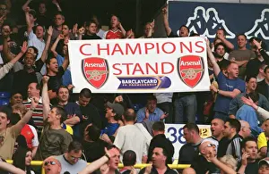 Arsenal fans with a Champions Banner. Tottenham Hotspur v Arsenal